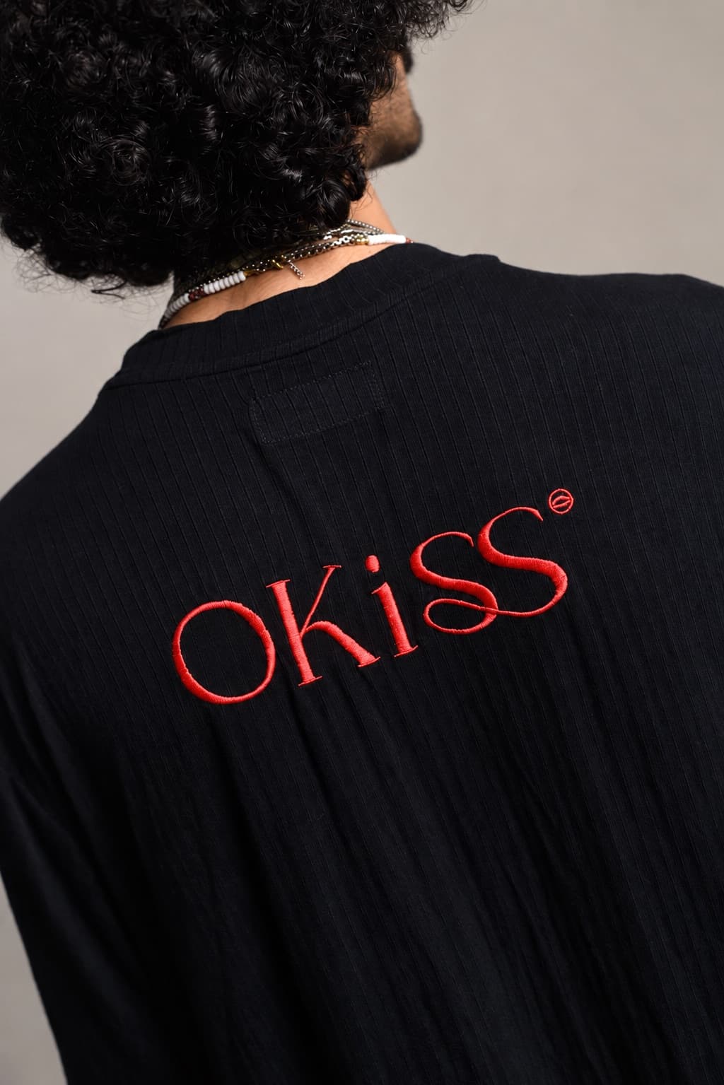OKiSS Tee — Black · back embroidery